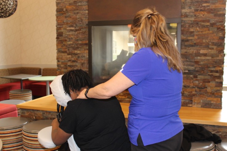 Student getting a chair massage at Destress Fest