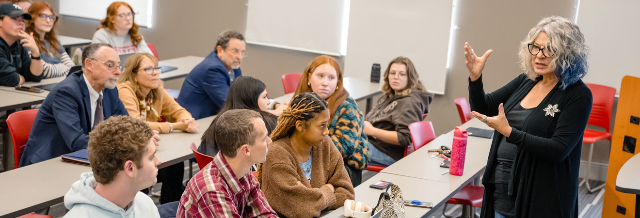 Gwen Torges leads a discussion with a class