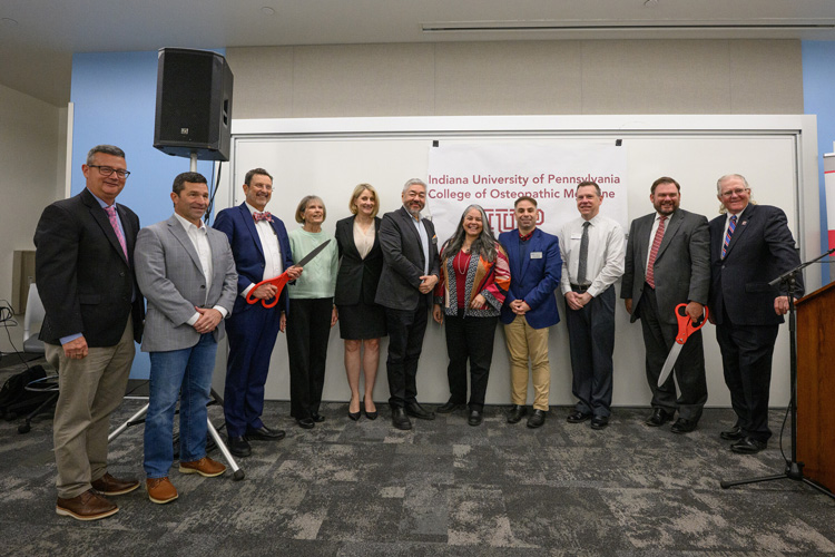  IRMC and Mountains Health CEO and President Steve Wolfe; Rep. Jim Struzzi; IUP President Dr. Michael Driscoll; Trustee Susan Delaney; Trustee Laurie Kuzneski; COM Founding Associate Dean Dr. Luke Mortensen; COM Founding Dean Dr. Miko Rose; COM Founding Associate Dean Dr. Ryan Smith; COM Director of Admissions and Student Affairs  Jamie Murphy; Sen. Joe Pittman; Trustee Chair Sam Smith