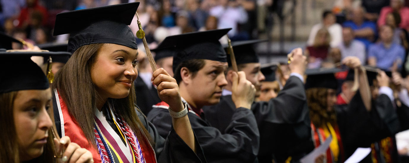 Graduating students moving their tassels during the Commencement ceremony