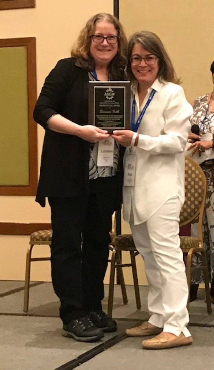 Lorraine Guth accepting the ASGW Presidential Award