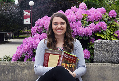 Lindsey Smathers reads a criminology book