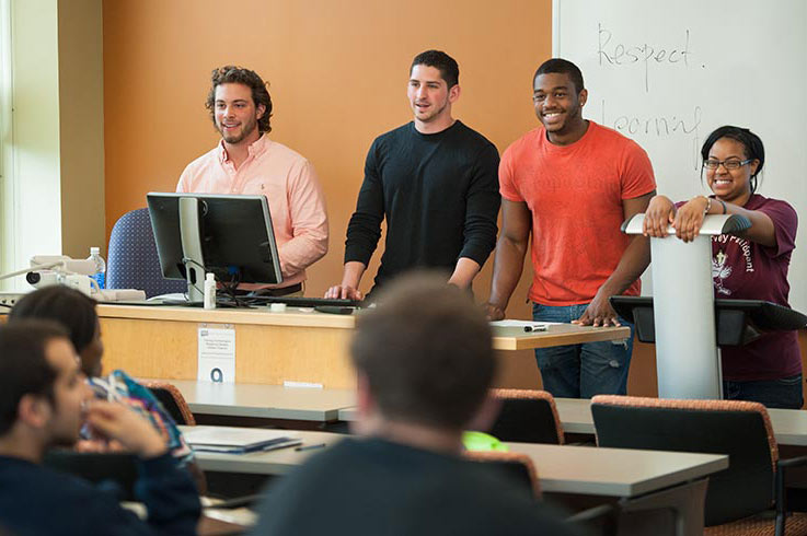 Students give a presentation in a Criminology class