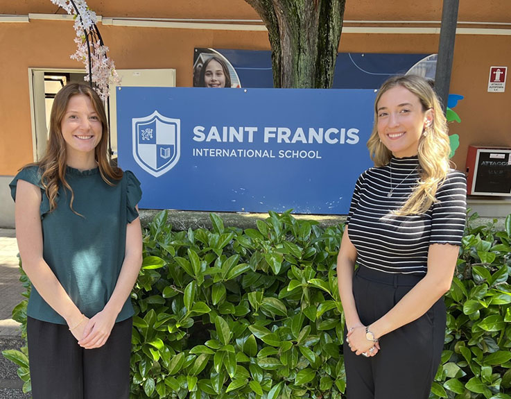 IUP Students standing in front of St. Francis sign in Rome