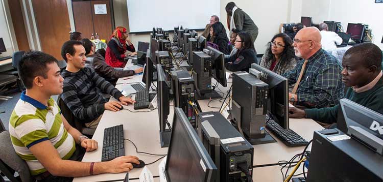 Students working on computers in the International Leaders in Education Program (ILEP) technology workshop 