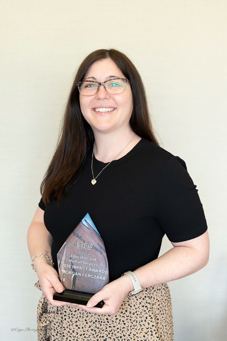 Morgan Ferczak with Impact Award