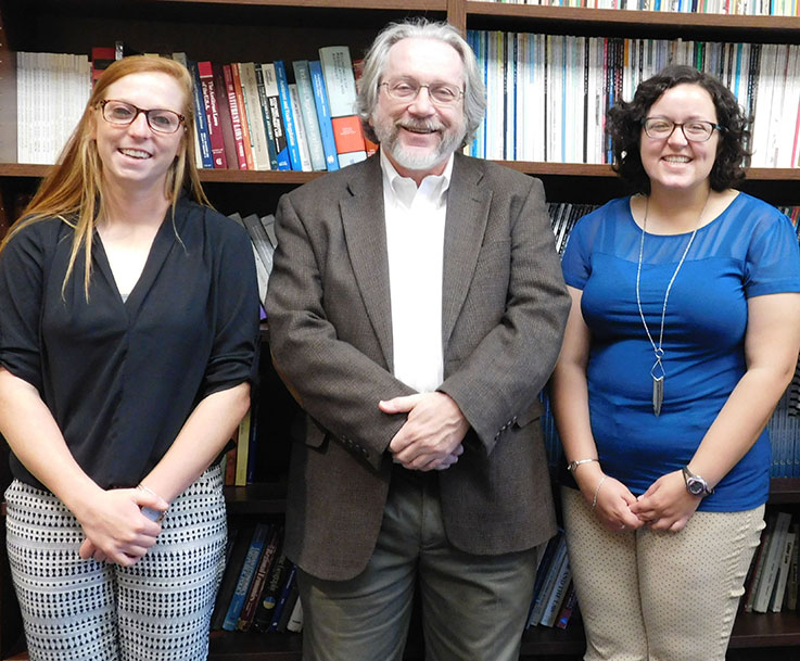 Dr. Karl McDermott met with recipients of his scholarship, Hannah Mercer and Megan Gochenauer, while visiting campus.