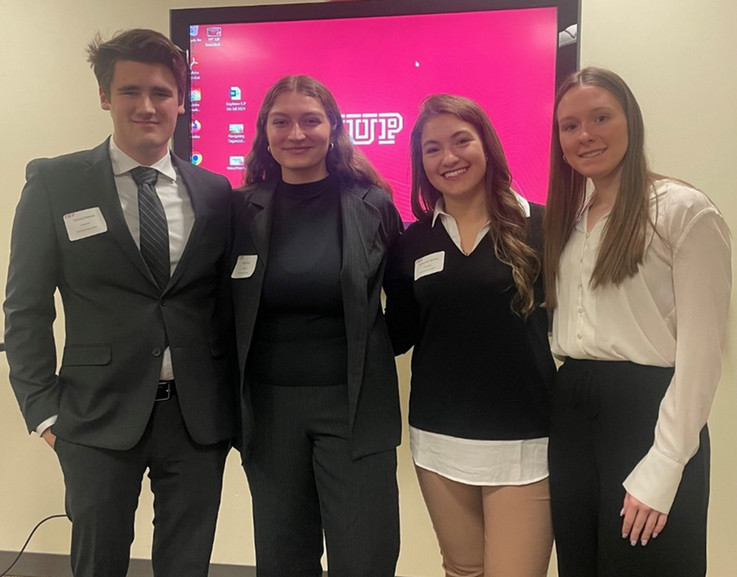Econometric student podium presenters (l to r):  Connor Sowers, Kylie Miller, Catherine Martsolf, and Katelyn Krish