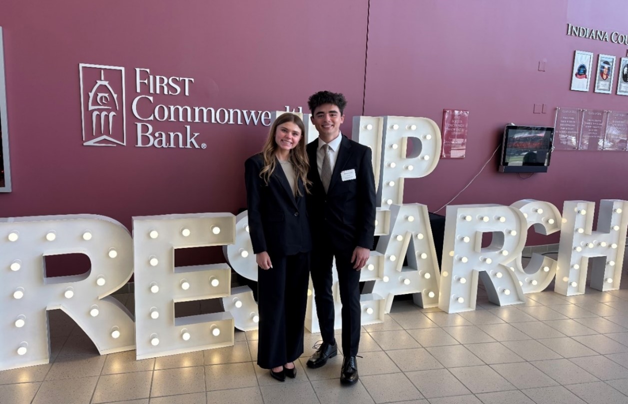 Econometric student podium presenters (l to r):  Anna Horvath and Dominick Ditoro<