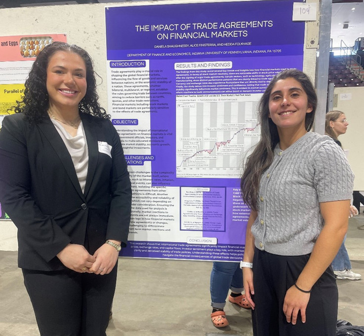 International Finance student poster presenters (l to r):  Daniela Shaughnessy and Alice Finisterra