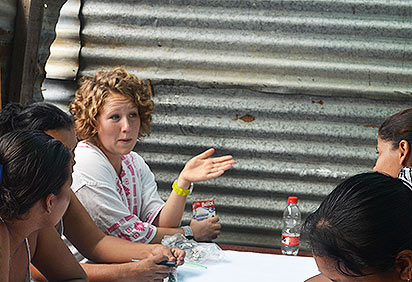 Gretchen Heine at a table with women in Nicaragua