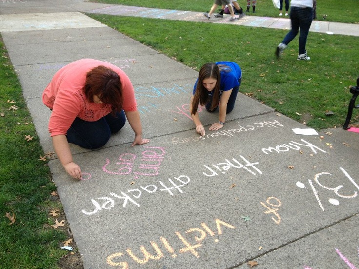 students chalking the walk