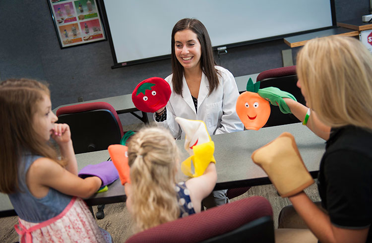 Food and Nutrition student working with children