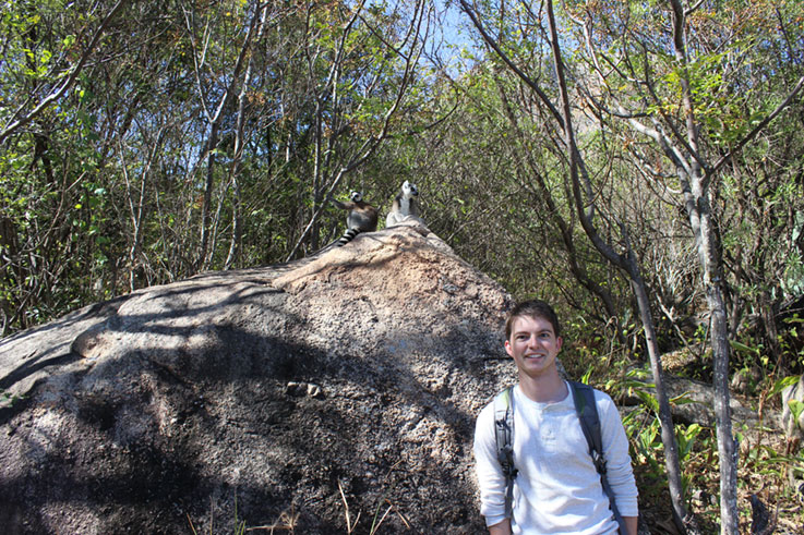 Kyle Murray with lemurs in Madagascar 