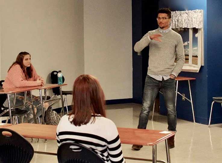 Christian Jones speaking to students
