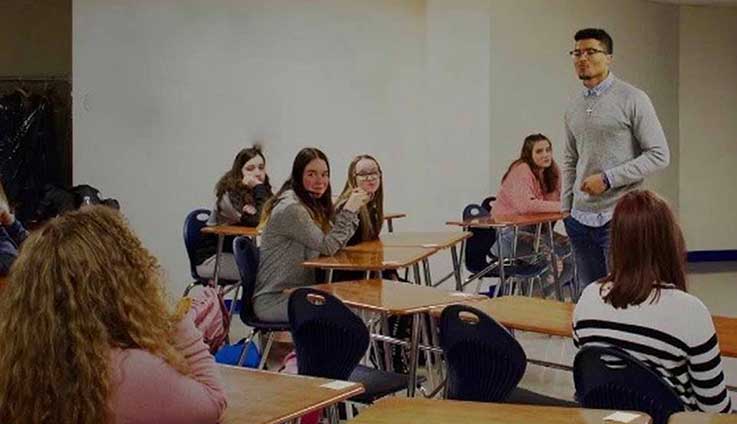 Christian Jones speaking to students