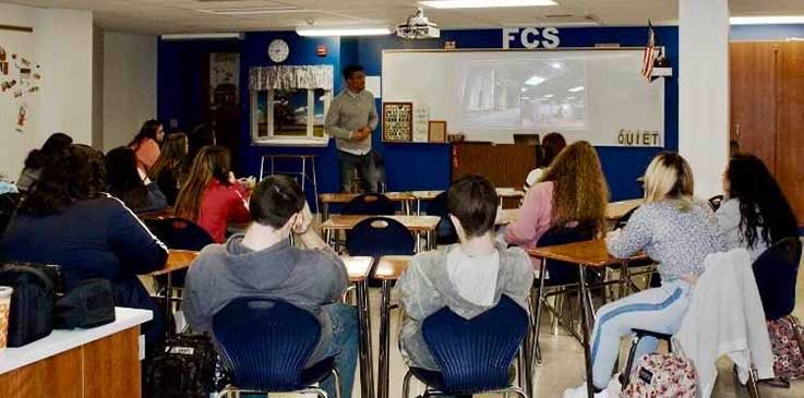 Christian Jones speaking to students