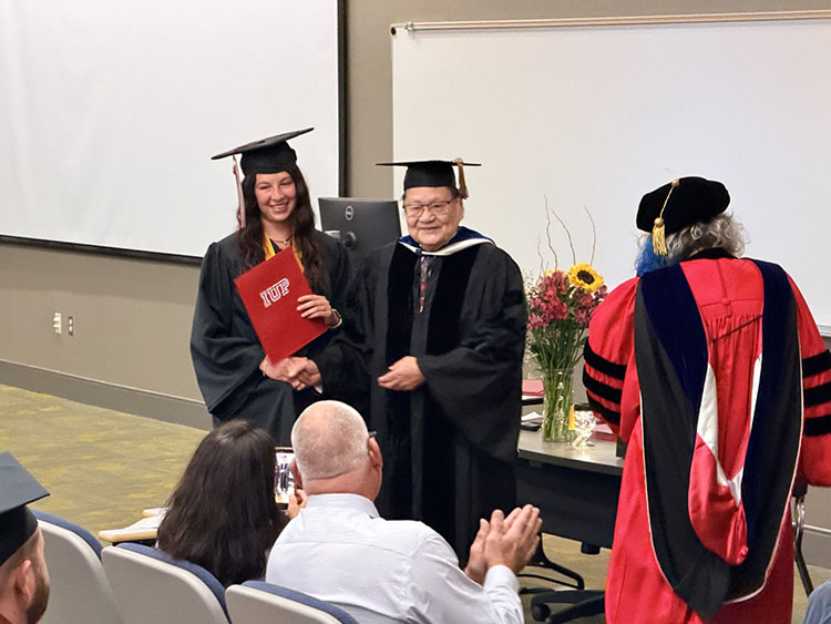 Dr. Chan and granddaughter Charise McNeal