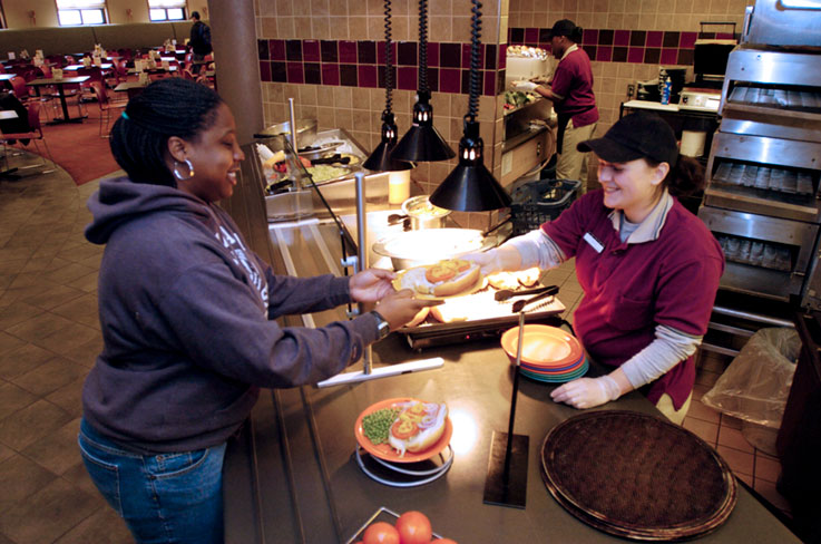 Student getting a meal at Foster Dining Hall 