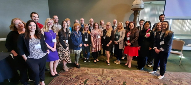 IUP graduates and conference committee