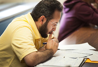 a student at a desk studying