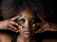 Woman with animal print face paint 