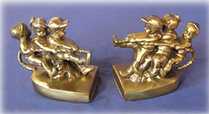 “Tug of War” Brass Bookends