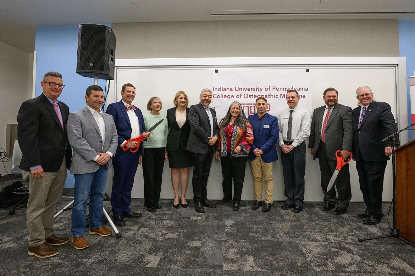 At the announcement of pre-accreditation status, from left: Indiana Regional Medical Center CEO Steve Wolfe; state representative Jim Struzzi; IUP President Michael Driscoll; IUP trustees Susan Snell Delaney ’64 and Laurie Frisina Kuzneski ’93; the College of Osteopathic Medicine’s Luke Mortensen, Miko Rose, Ryan Smith, and Jamie Murphy; state senator Joe Pittman; and trustees chair Sam Smith.