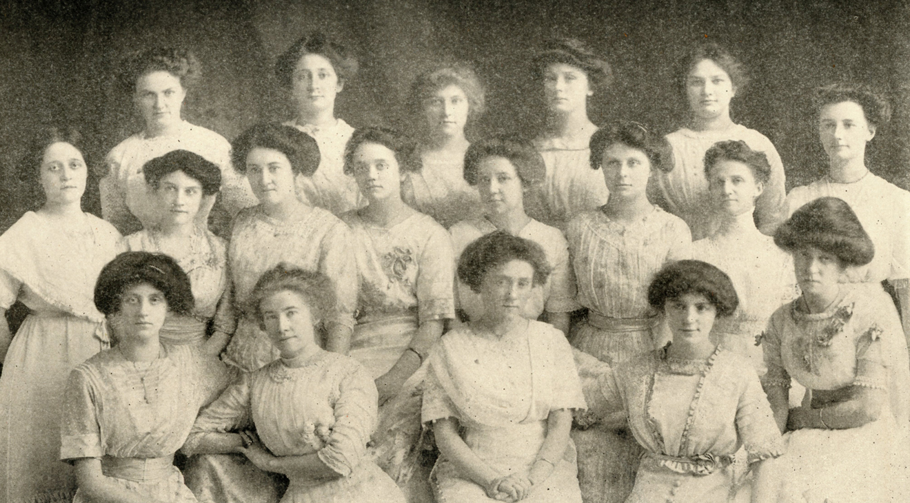 black and white photo of IUP students in dresses