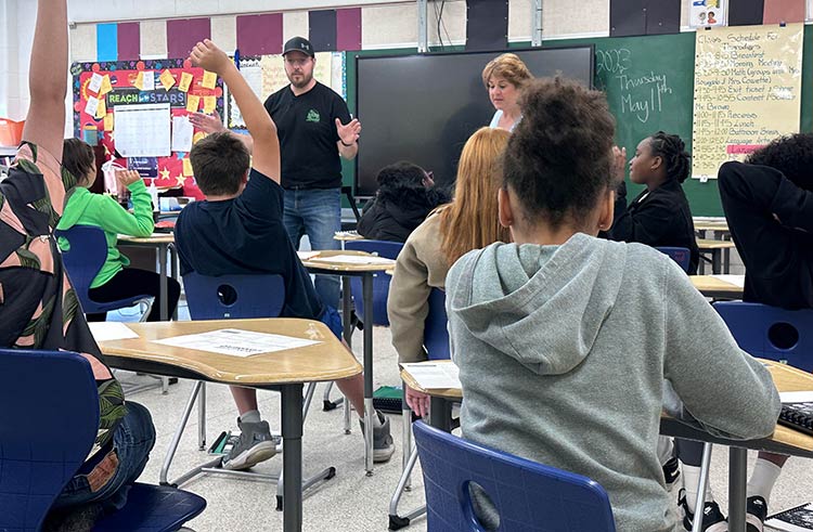 Ninth Street Deli’s Josh Muscatello during his visit to Birdneck Elementary School