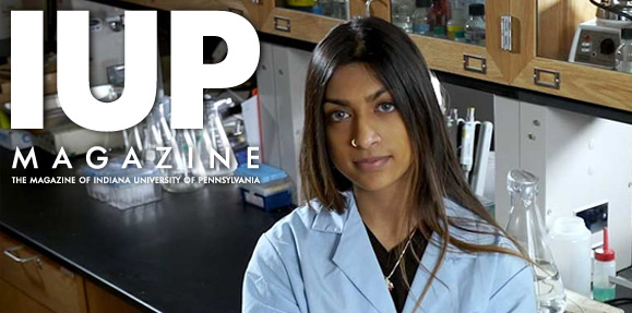 female student sitting in a lab