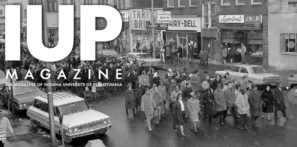 historic photo of people marching in Indiana