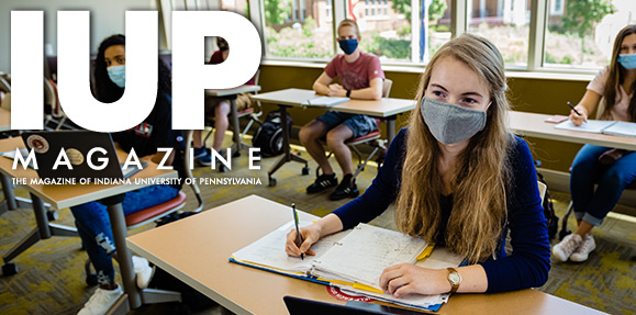students wearing masks in a classroom
