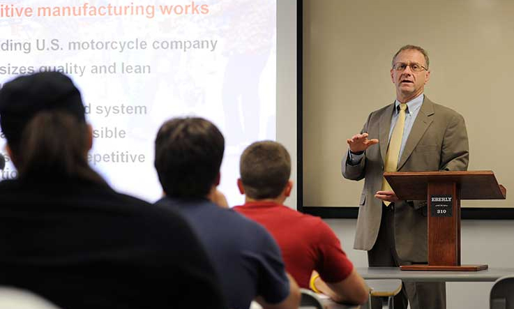 A professor teaches a class in Eberly.