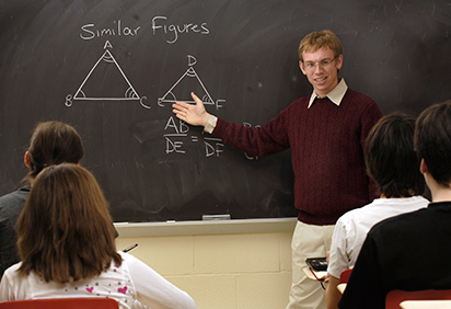 A student teacher teaches in the classroom