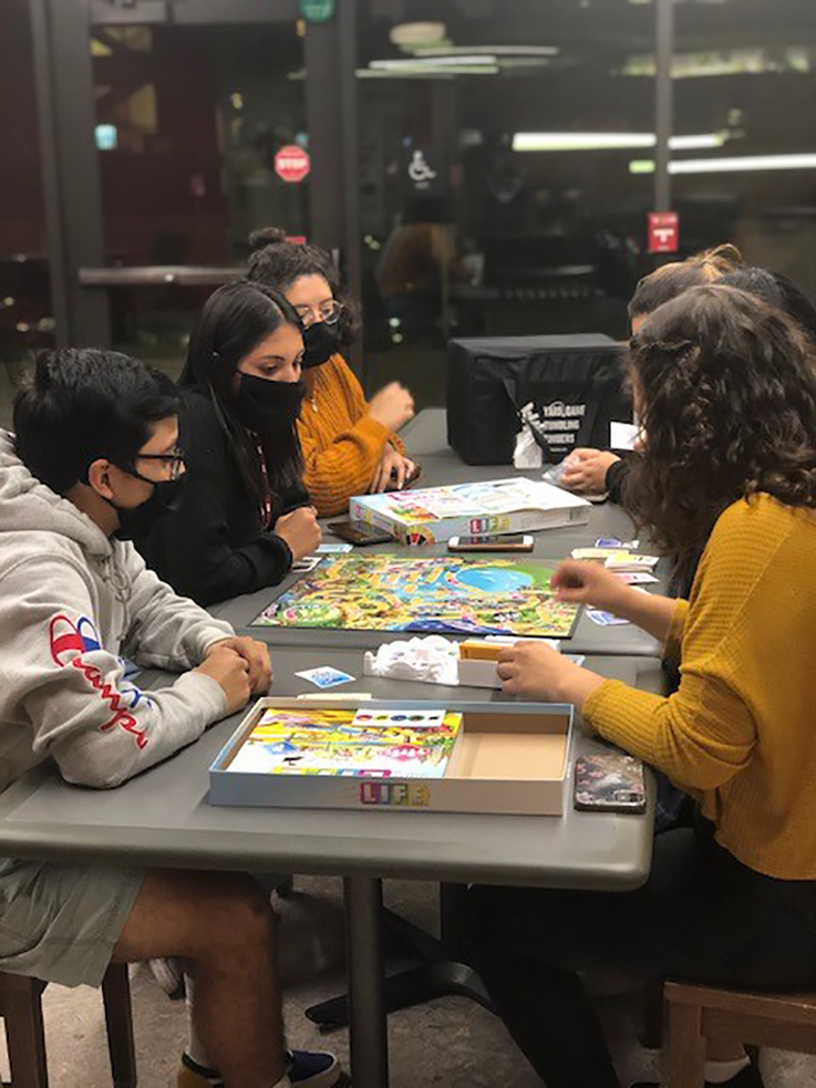 student playing a board game