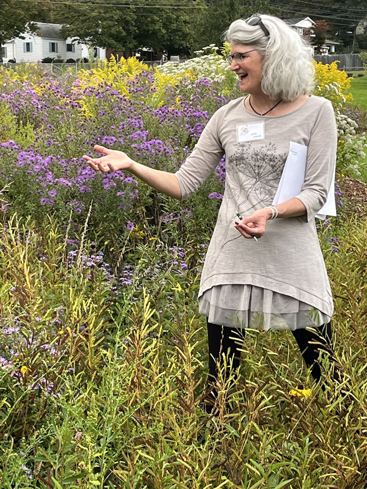 image of Barbara Hauge in a field of flowers