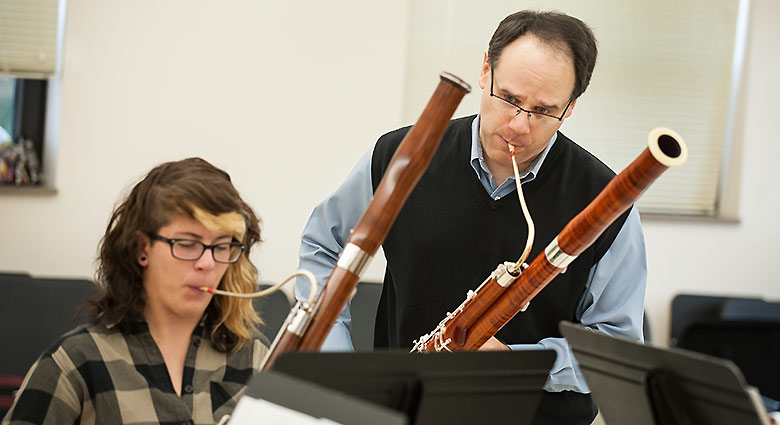 A student has a music lesson with Dr. Worzbyt
