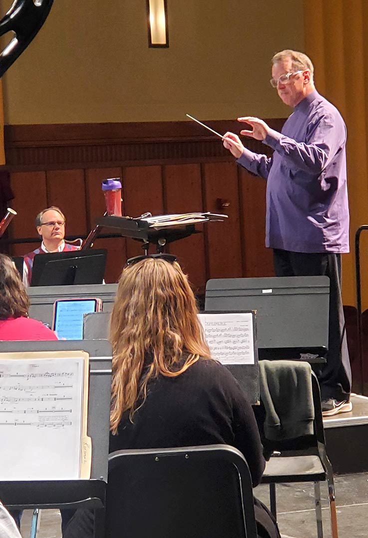 Timothy Paul, IUP director of Bands, led the Keystone Wind Ensemble during a rehearsal.