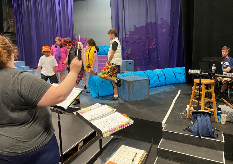 Direct Amber Leitsch directs Footlight Players in a tech rehearsal of Finding Nemo, Jr. on the Theater-by-the-Grove main stage.