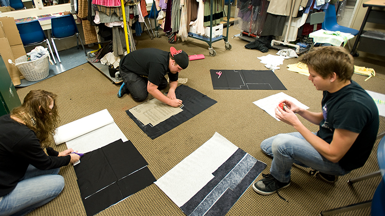 Students getting costumes ready 