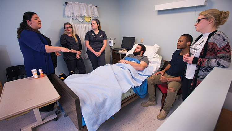 Theater students act in a simulated patient environment in a project with the Nursing Department Theatre students act in a simulated patient environment in a project with the Nursing Department