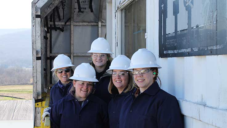 The Ladies of Safety student organization tours an industrial site with Professor Laura Rhodes