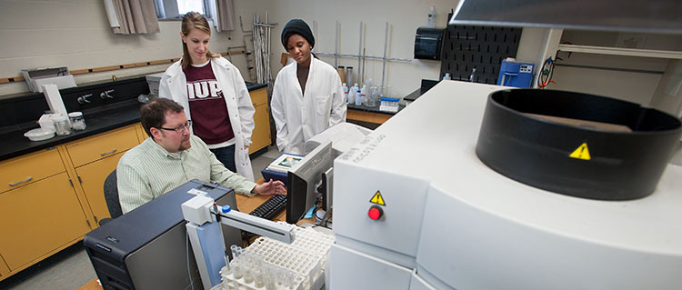Students work with chemistry Professor Nathan McElroy. Environmental Engineering majors work closely with professors from many departments who are experienced in environmental science and technology. Students work with chemistry Professor Nathan McElroy. Environmental Engineering majors work closely with professors from many departments who are experienced in environmental science and technology.