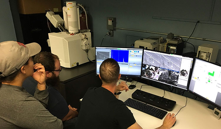 Students working in the SEM Lab