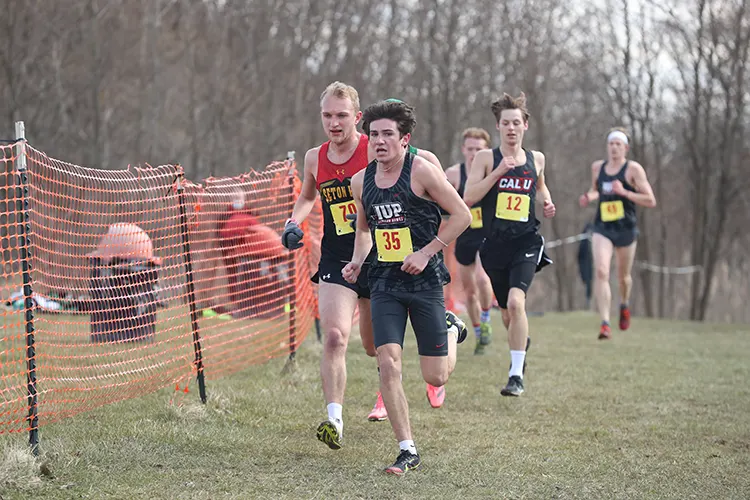 Marco Cardone running with a group of other students