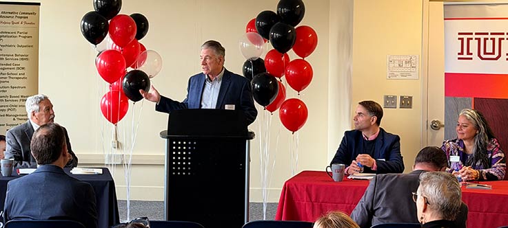 CEO of ACRP Frank Janakovic, Glenn Kashurba at podium, IUP COM Founding Associate Dean of Clinical Affairs and Graduate Medical Education Ryan Smith, IUP COM Founding Dean Miko Rose.