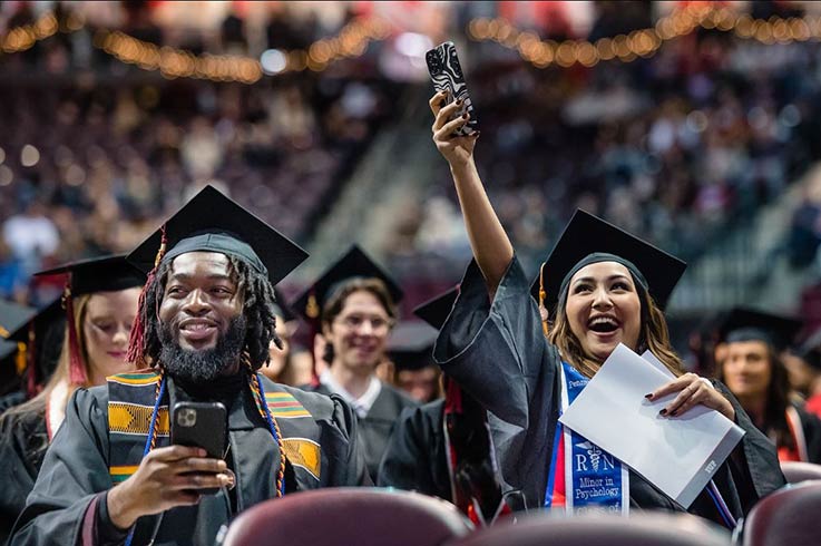 Students celebrating at commencement