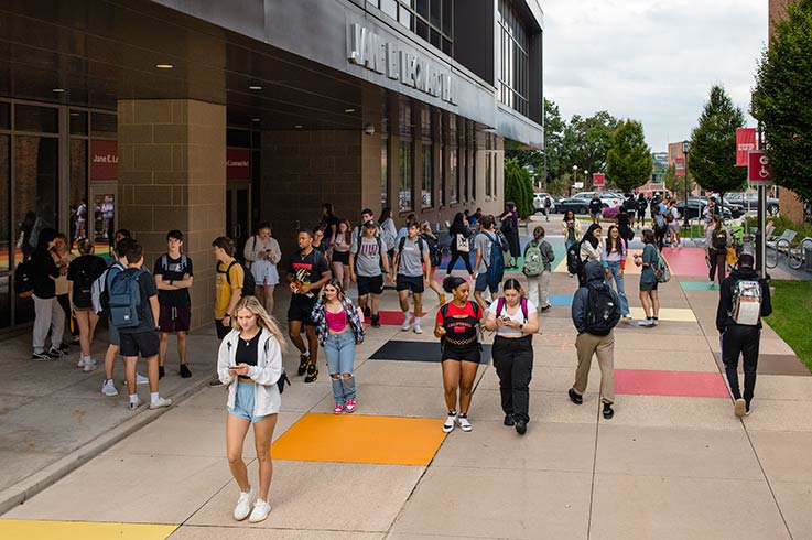 Students walking between buildings between classes