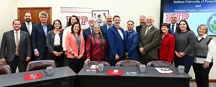 Group photo of all involved in the signing